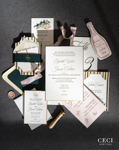 Wedding invitation suite by Ceci New York with Juliette calligraphy, striped details, a champagne-shaped card and an illustrated envelope liner.