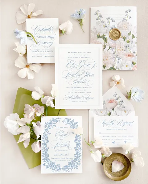 Wedding invitation suite by Jessica Hinton of Empress Stationery, featuring Mozart Script calligraphy by Blessed Print and delicate botanical stationery.