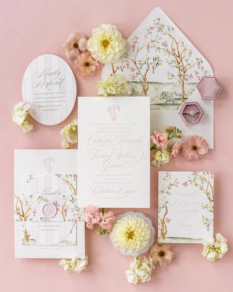 Pink Charlotte wedding invitation suite by Empress Stationery featuring Juliette calligraphy, chinoiserie envelope liners, fresh flowers and wax seals.