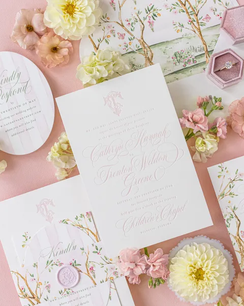 Pink wedding invitation by Empress Stationery with Juliette calligraphy, a floral chinoiserie envelope liner and coordinating monogrammed stationery.