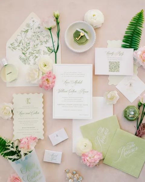 Pink and green wedding invitation suite by Kate Eliza Creative featuring Mozart Script, a botanical toile liner and scalloped edges.