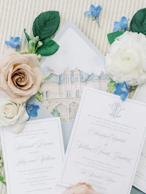 Wedding stationery by Sincerely Rachel with Juliette calligraphy and a watercolor illustration of The Wimbish House on the envelope liner.